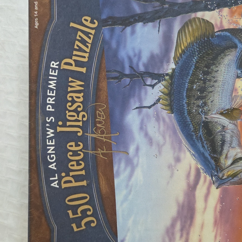 Al AGNEW'S PREMIER 550 PIECE JIGSAW PUZZLE. Strike King FISH BEING CAUGHT.